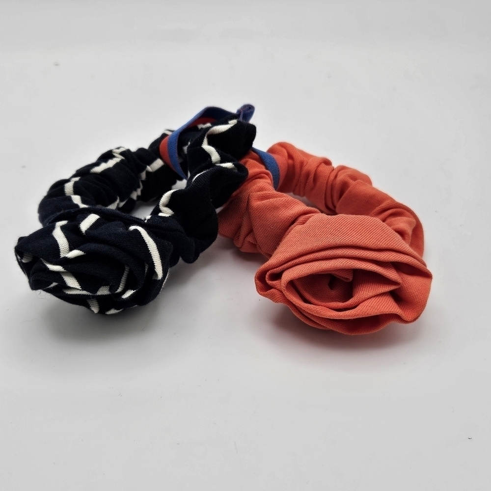 pair of scrunchies with rosettes navy stripe and salmon orange